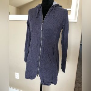 Purple hooded, sweatshirt with top/bottom zipper. Size small. Super comfortable